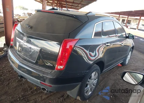 2014 Cadillac Srx Luxury Collection z USA, uszkodzony, nr VIN 3GYFNBE38ES559994